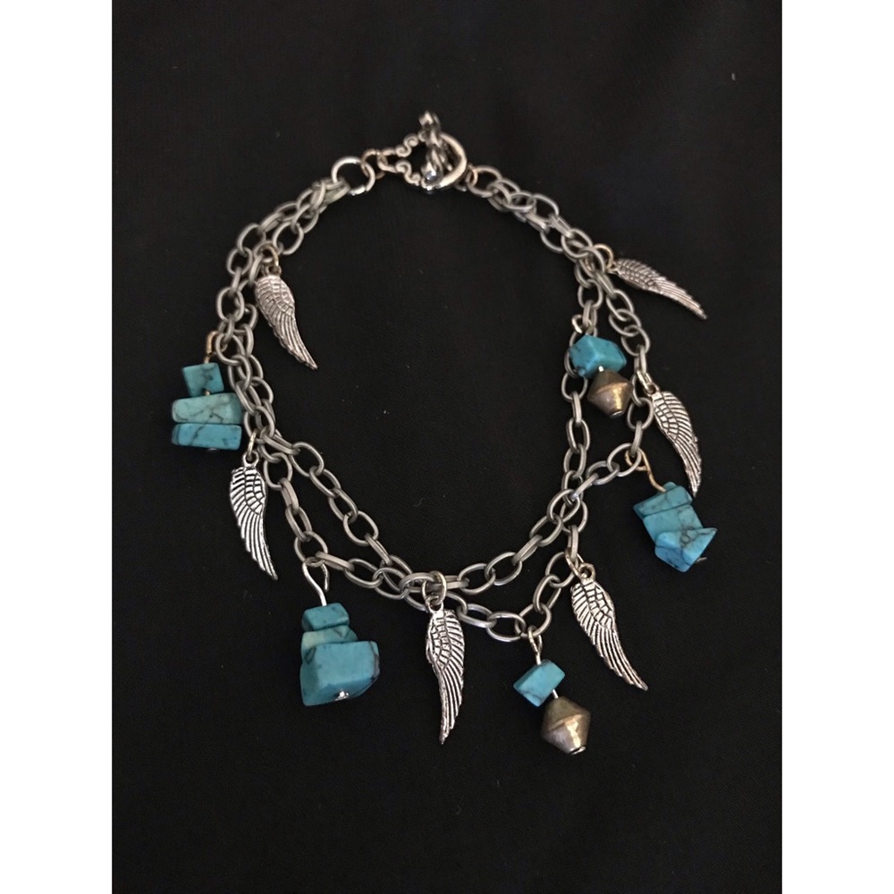 Turquoise Angel wing charm bracelet.